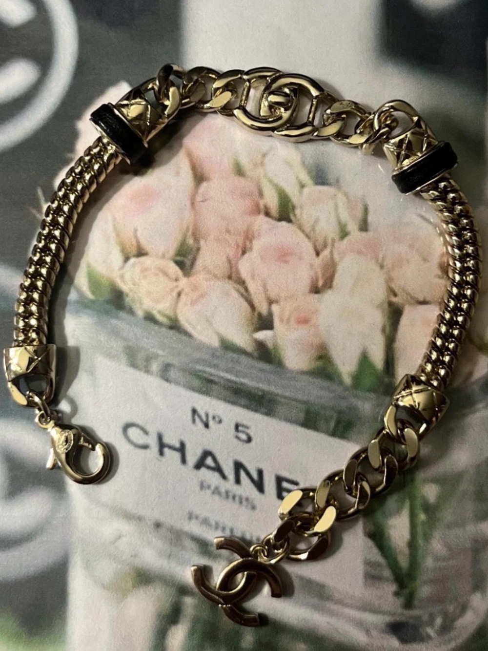 CHANEL Gold-Tone Chain Bracelet with CC Charm and Black Accents